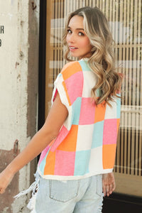 Sweater Vest with a Multi-Colored Checker Pattern