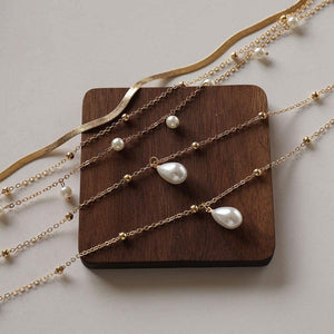 Multilayered Pearl Accented Gold Chain Necklace