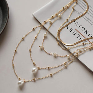 Multilayered Pearl Accented Gold Chain Necklace